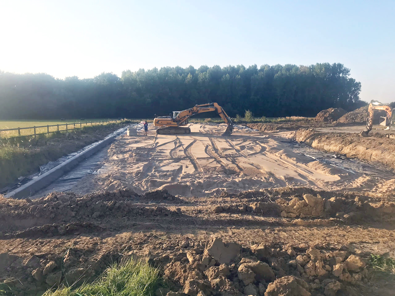 Le Clos d'Arion - Grondwerken met graafmachine Le Clos d'Arion - Grondwerken met graafmachine